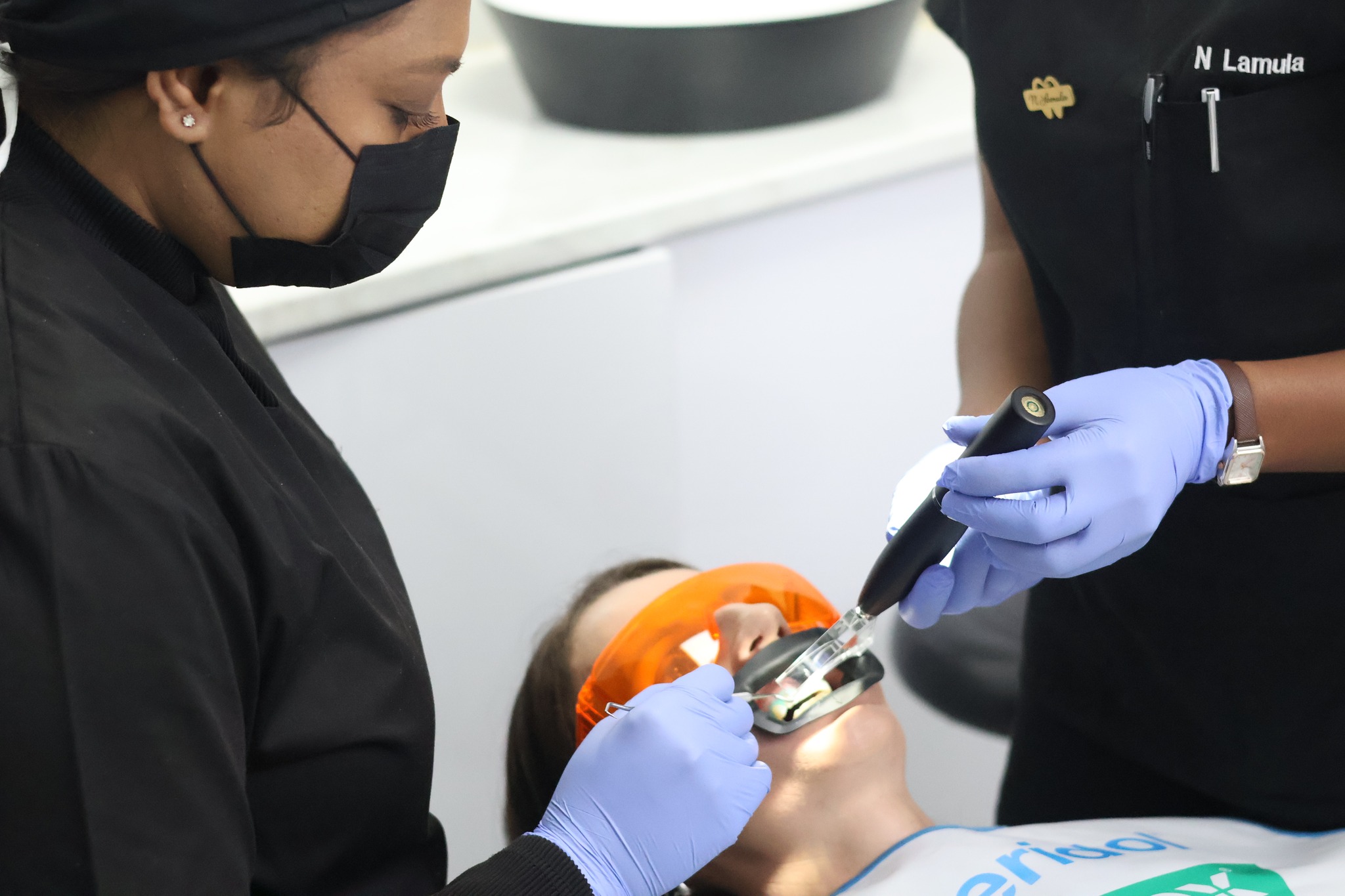 Dr Shazia Khan and her team treating a patient at The Smile Space, Hayfields Mall